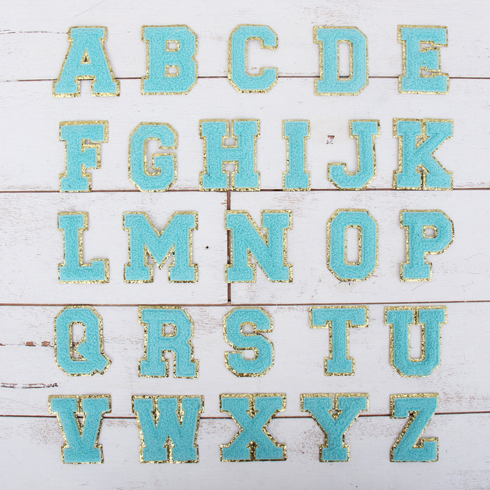 26 Letter Set of Blue Iron On Varsity Letter Patches - Full Alphabet - Large 8 cm Chenille with Gold Glitter - Threadart.com