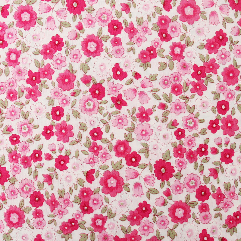 a pattern of pink and white flowers with green leaves, creating a visually appealing and vibrant design.