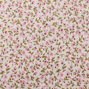 a repeating pattern of pink flowers and green leaves on a white background.