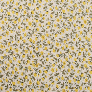 a repeating pattern of yellow flowers and green leaves on a white background.