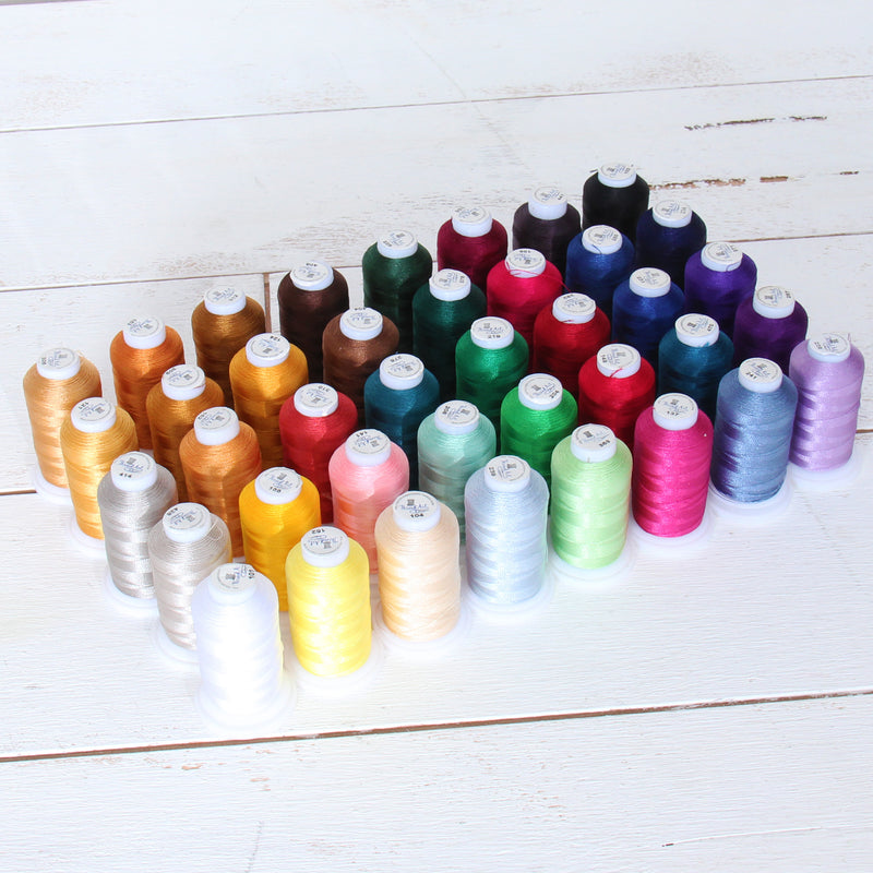 All-In-One Embroidery Machine Starter Set With Threads, Designs, Stabilizer, Bobbins, & Rack - Threadart.com