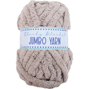 A ball of chunky, light brown yarn labeled as "Jumbo Yarn" is shown against a white background.