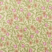 a repeating floral pattern with pink flowers and green leaves on a yellow background.