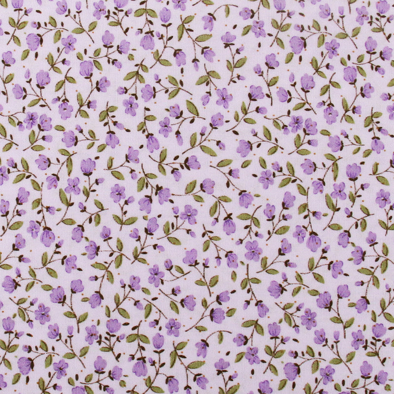 a repeating pattern of purple flowers and green leaves on a light pink background.