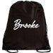 A black drawstring bag with the name "Brooke" printed in white on it.