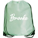 A mint green drawstring backpack with the name "Brooke" printed on it in white cursive text.
