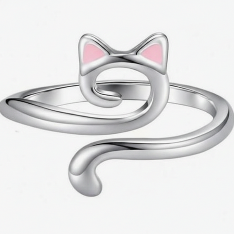 Silver cat-shaped ring with pink accents on a white background