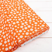 Premium Cotton Quilting Fabric Sold By The Yard - Confetti Brights Collection - Orange Daisies - Threadart.com