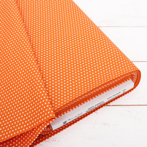 Premium Cotton Quilting Fabric Sold By The Yard - Confetti Brights Collection - Orange Dots - Threadart.com