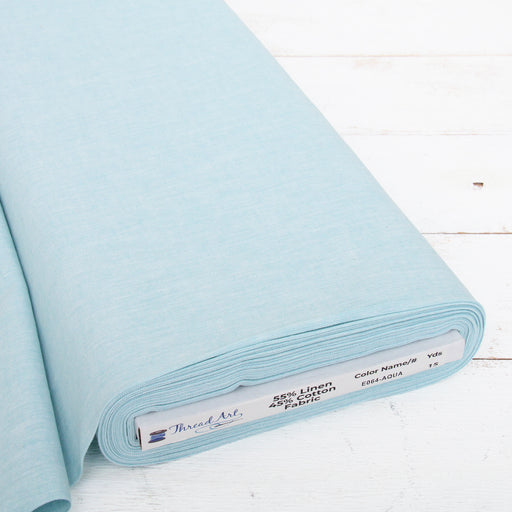 Aqua yarn dyed homespun cotton linen blend fabric on the bolt