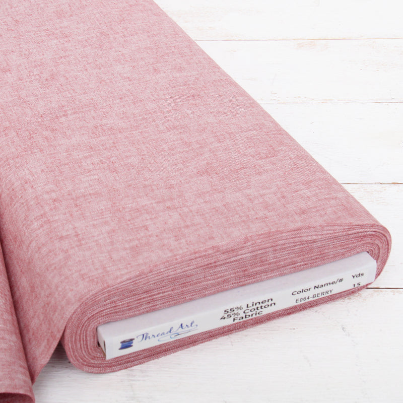 Berry yarn dyed homespun cotton linen blend fabric on the bolt