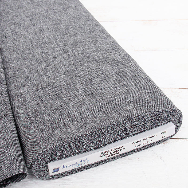 Black yarn dyed homespun cotton linen blend fabric on the bolt