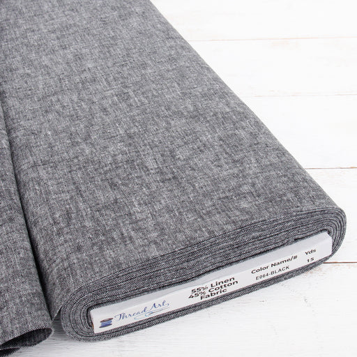 Black yarn dyed homespun cotton linen blend fabric on the bolt
