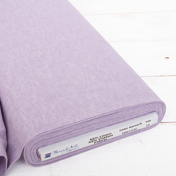 Lilac yarn dyed homespun cotton linen blend fabric on the bolt