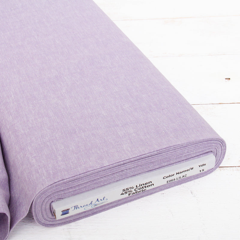 Lilac yarn dyed homespun cotton linen blend fabric on the bolt