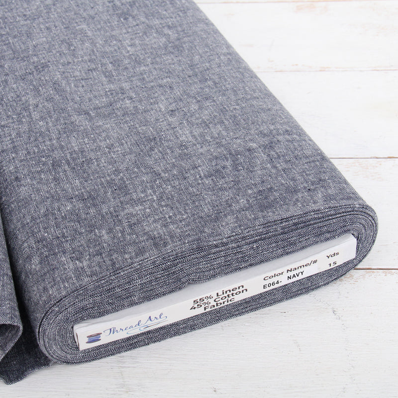 Navy yarn dyed homespun cotton linen blend fabric on the bolt