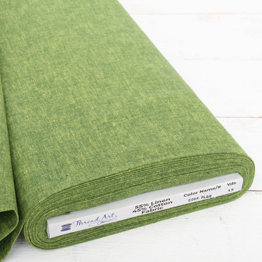 Palm green yarn dyed homespun cotton linen blend fabric on the bolt