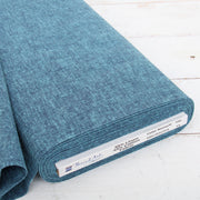 Peacock blue yarn dyed homespun cotton linen blend fabric on the bolt