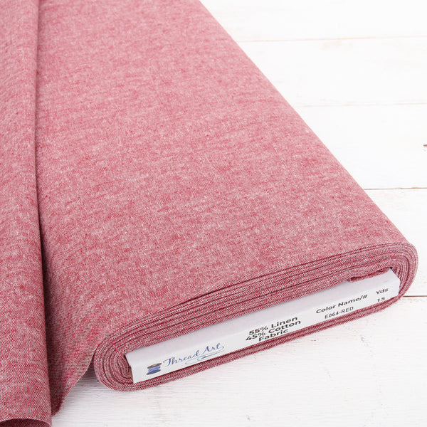 Red yarn dyed homespun cotton linen blend fabric on the bolt