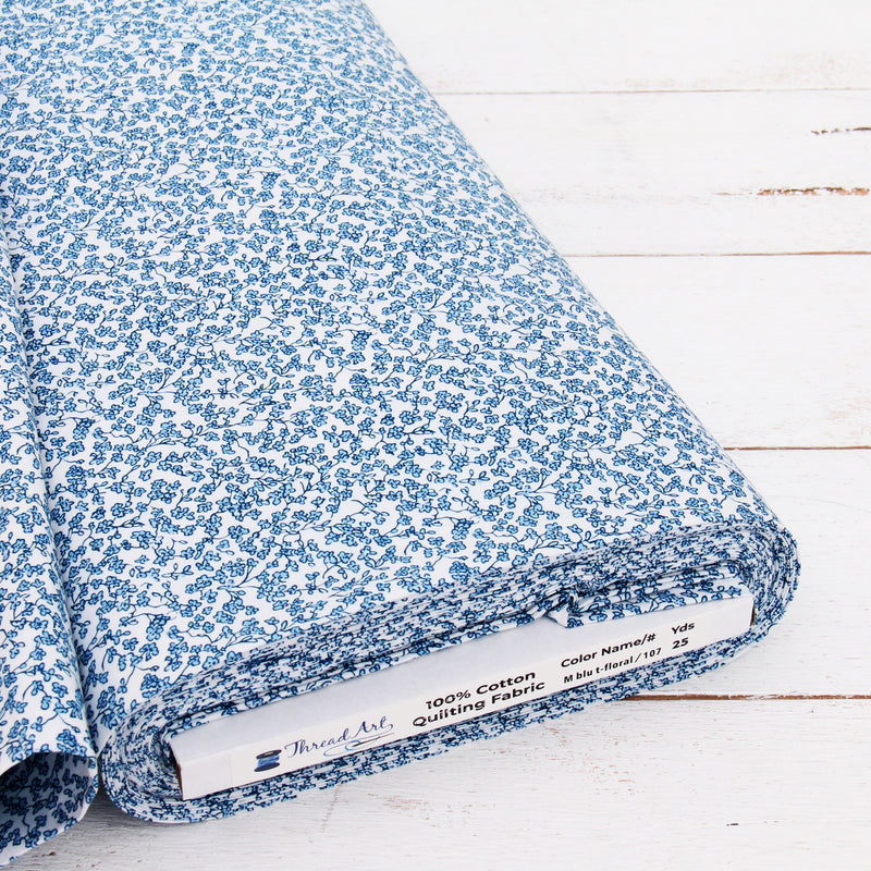 Premium Cotton Quilting Fabric Sold By The Yard - Vintage Threads Collection - Medium Blue Tiny Flower - Threadart.com