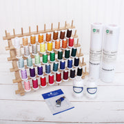 All-In-One Embroidery Machine Starter Set With Threads, Designs, Stabilizer, Bobbins, & Rack - Threadart.com