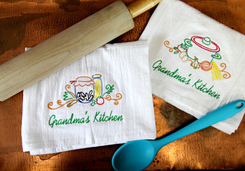 Seasonal machine embroidery designs stitched on flour sack towels