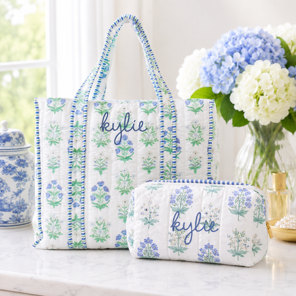Personalized quilted blue block print tote and matching zipper pouch set embroidered with a name