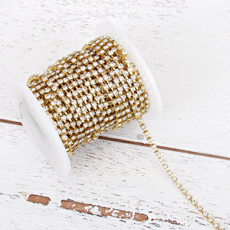 Rhinestone Chain SS10 - 10 yd Roll - Crystal/Gold - Threadart.com