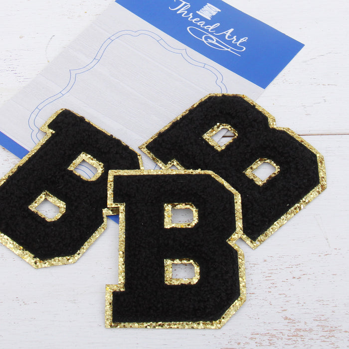 Black Iron On Varsity Letter Patches - Set of 3 Letters - Large 8 cm Chenille with Gold Glitter - Threadart.com