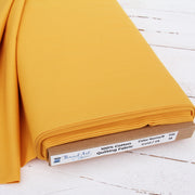 Premium Cotton Quilting Fabric Sold By The Yard - Solid Gold - Threadart.com