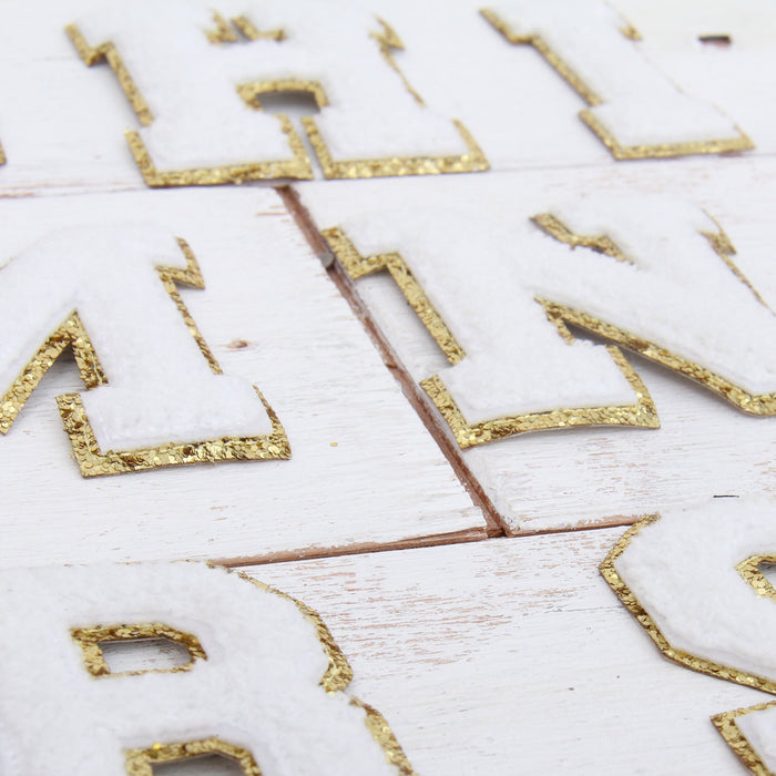 26 Letter Set of White Iron On Varsity Letter Patches - Full Alphabet - Large 8 cm Chenille with Gold Glitter - Threadart.com